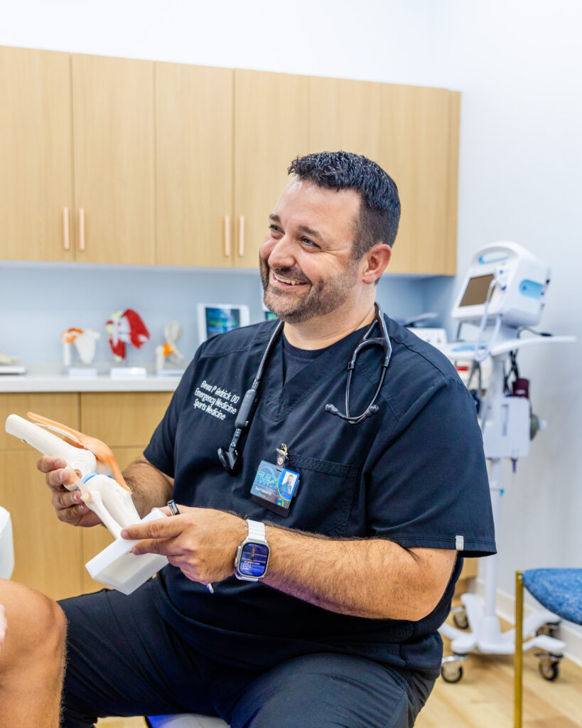 doctor educating on sports medicine