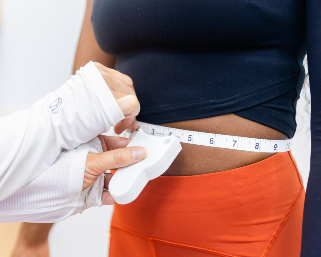 weight loss clinic taking measurments