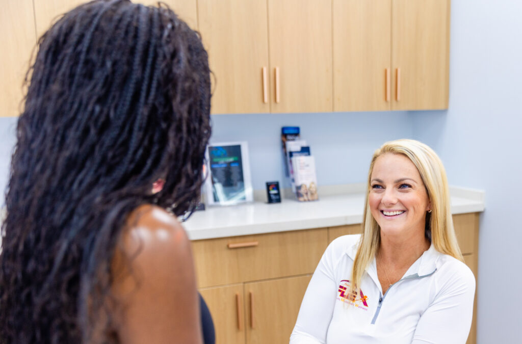 “Doctor administering a medication injection to a patient, ensuring proper technique in a safe and professional clinical environment.”